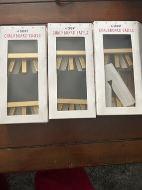 12 chalkboard easels. Table top placemat cards.